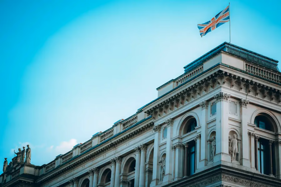 London building with Union Jack — leave UK tax residency guide
